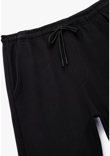 Beli Bağcıklı Pamuklu Cep Detaylı Spor Şort modelleri