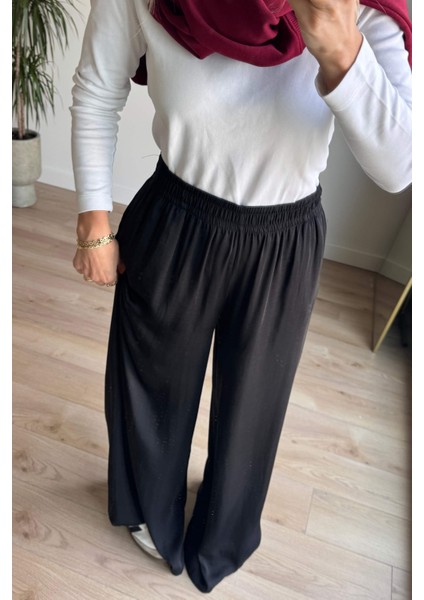 Siyah Beli Lastikli Bol Paça Dökümlü Saten Pantolon fiyatları
