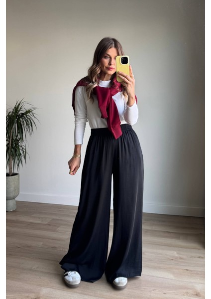 Siyah Beli Lastikli Bol Paça Dökümlü Saten Pantolon modelleri