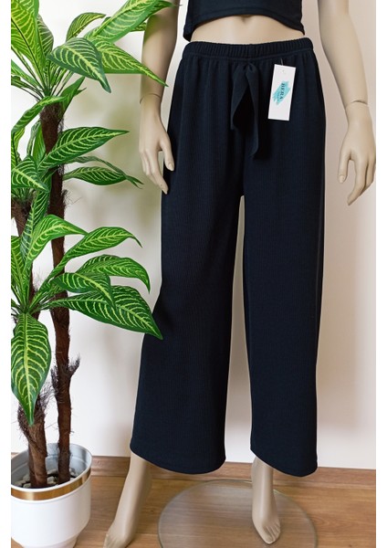 Kadın Siyah Beli Lastikli Dökümlü Geniş Paça Burgu Kumaş Palazzo Pantolon modelleri