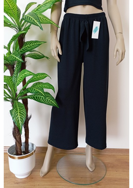 Kadın Siyah Beli Lastikli Dökümlü Geniş Paça Burgu Kumaş Palazzo Pantolon indirimleri