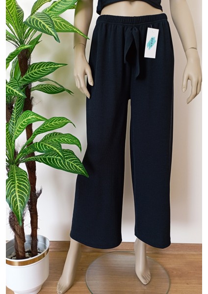 Kadın Siyah Beli Lastikli Dökümlü Geniş Paça Burgu Kumaş Palazzo Pantolon