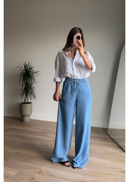 Mavi Beli Lastikli Bol Paça Salaş Model Ince Kot Pantolon