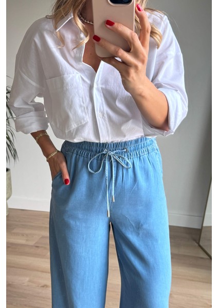 Mavi Beli Lastikli Bol Paça Salaş Model Ince Kot Pantolon fırsatları