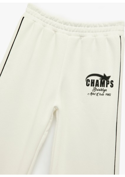 Şardonlu Baskılı Beli Lastikli Biyeli Geniş Paça Eşofman Altı modelleri