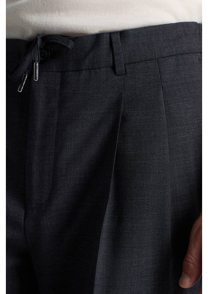 Yün Karışımlı Bağcık Detaylı Koyu Mavi Chino Jogger Pantolon fiyatları