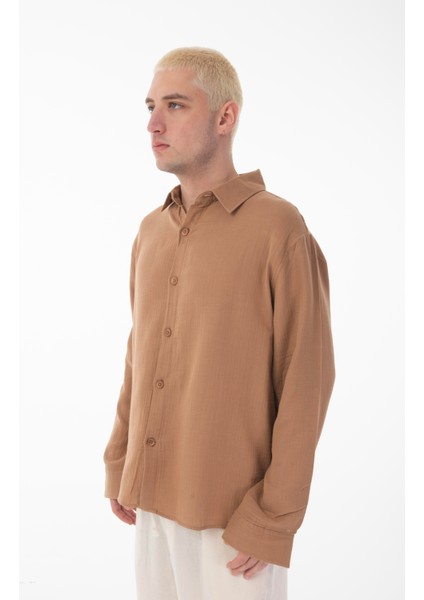 R-6048 Ayaklı Yaka Arka Roba Detaylı Uzun Kol Müslin Gömlek modelleri