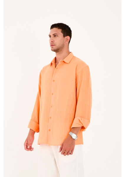 R-6048 Ayaklı Yaka Arka Roba Detaylı Uzun Kol Müslin Gömlek modelleri