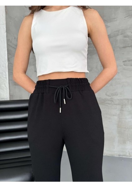 Kadın Yırtmaç Detaylı Dar Paça Modal Kumaş Eşofman Altı fiyatları