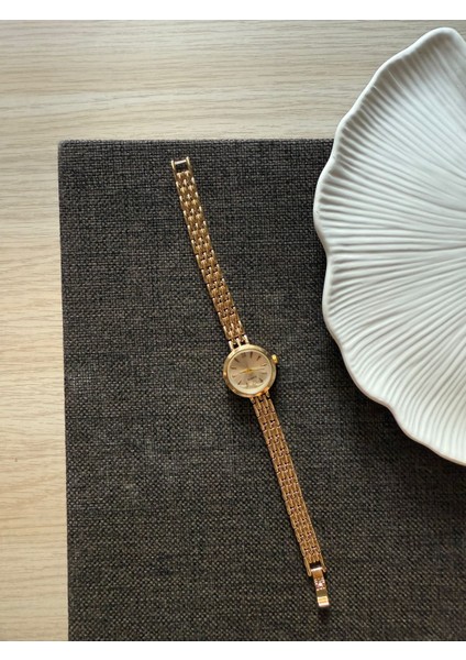 Retro Minimal Boncuk Kordon Vintage Kadın Kol Saati Yuvarlak