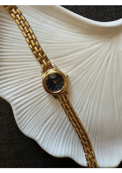 Retro Minimal Boncuk Kordon Vintage Kadın Kol Saati Minik Yuvarlak