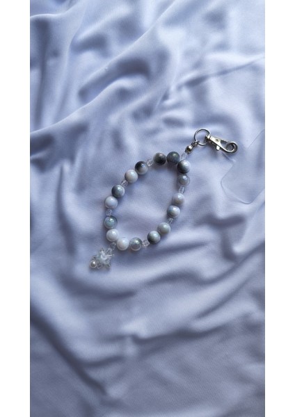 Gökyüzü Sükûneti – Yıldızlı Boncuklu Telefon & Çanta Charmı modelleri