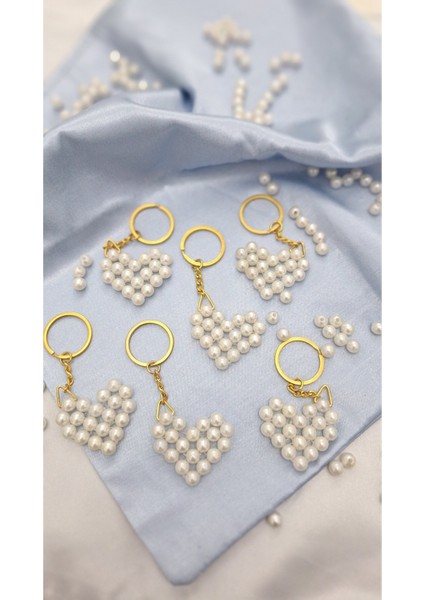 50 Adet Fıyatıdır.beyaz Inci Kalp Anahtarlık Tum Ozel Gunlerinizde Dağıtabileceğiniz Hedıyelıktir. fiyatları