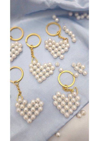 50 Adet Fıyatıdır.beyaz Inci Kalp Anahtarlık Tum Ozel Gunlerinizde Dağıtabileceğiniz Hedıyelıktir. fırsatları