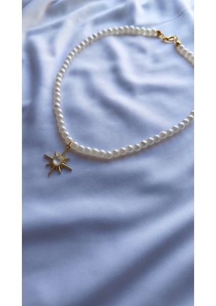 Güneşin Kalbi – Inci ve Altın Detaylı Kolye fırsatları