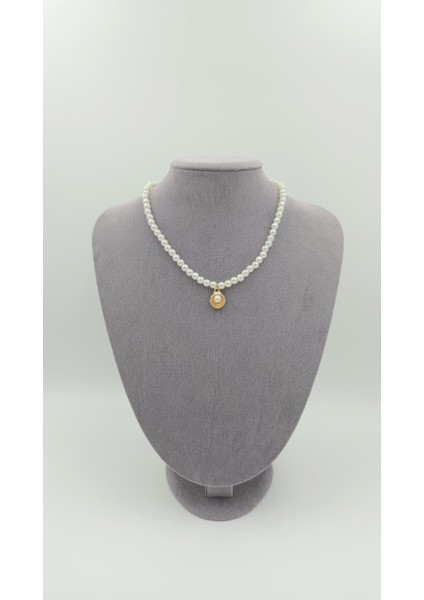 Zarif Deniz Kabuğu Detaylı Inci Kolye – Şıklığıyla Göz Kamaştıran Tasarım fiyatları