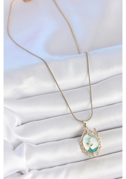 316L Çelik Gold Renk Zincir Mavi Mineli Çiçek Işlemeli Zirkon Taş Detaylı Portre Model Kadın Kolye - TJ-BKO10183 fiyatları