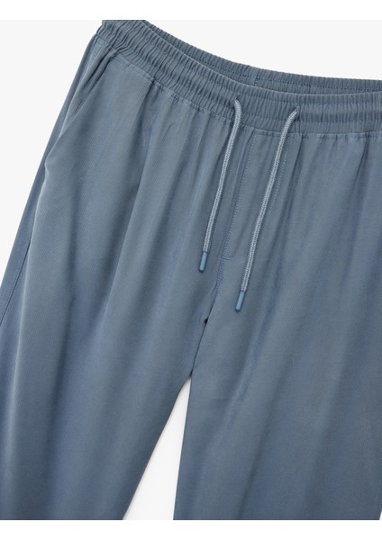 Viskon Cep Detaylı Rayon Tapered Beli Bağcıklı Pantolon indirimleri