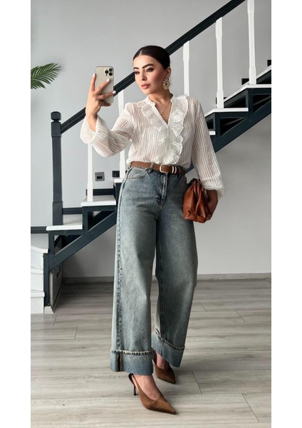 Mavi Tintli Paça Katlama Detaylı Jean fırsatları