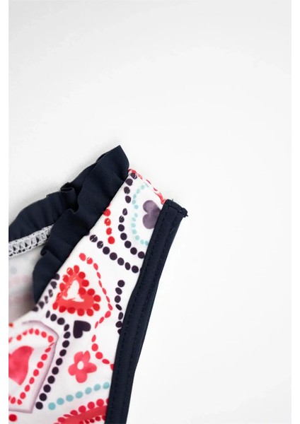 Kız Bebek Beyaz Kalp Desenli Lacivert Fırfırlı Bikini Altı