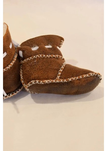 Bebek Sütlü Kahve Parlak Arkadan Bağcıklı Bot Tipi Kuzu Derisi Patik indirimleri