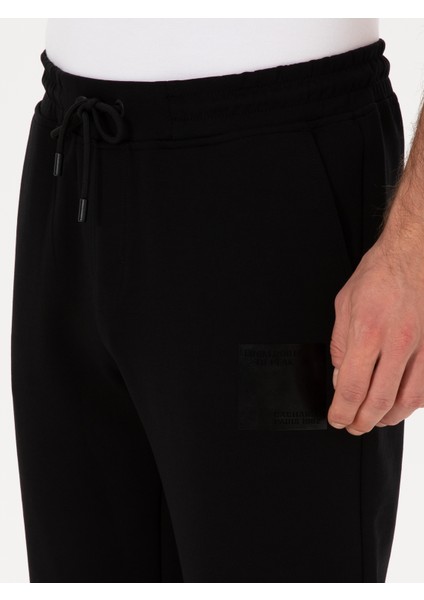 Erkek Siyah Slim Fit Pamuk Karışımlı Paçası Lastikli Eşofman Altı 50311677-VR046