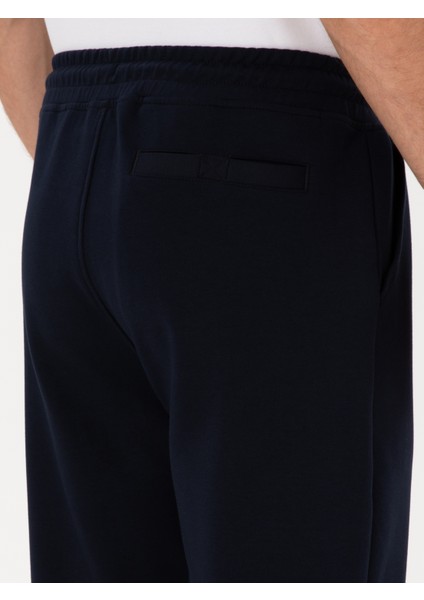 Erkek Lacivert Slim Fit Pamuk Karışımlı Paçası Lastikli Eşofman Altı 50311677-VR033