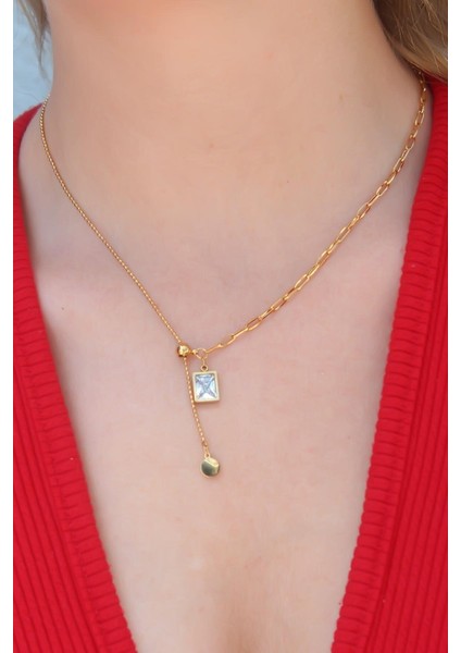 (AFRODIT)741 - 316L Çelik Gold Renk Zirkon Taşlı Sallantı Model Kadın Kolye