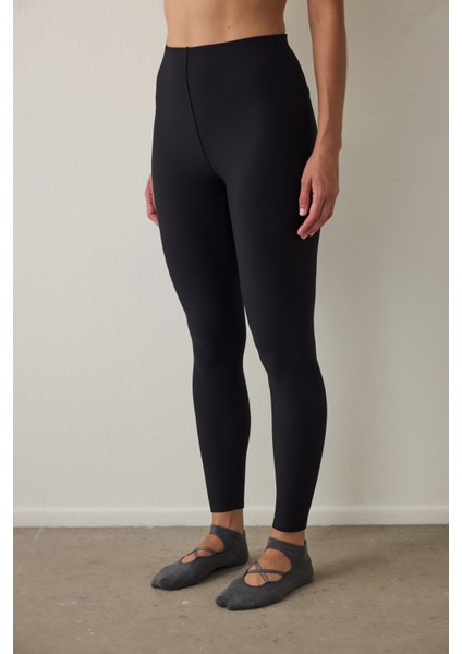 Siyah Yüksek Bel Toparlayıcı Cut Out Detaylı Fitilli Tayt