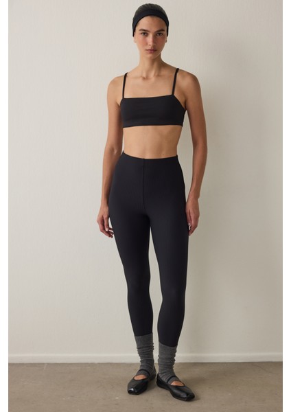 Siyah Yüksek Bel Toparlayıcı Cut Out Detaylı Fitilli Tayt