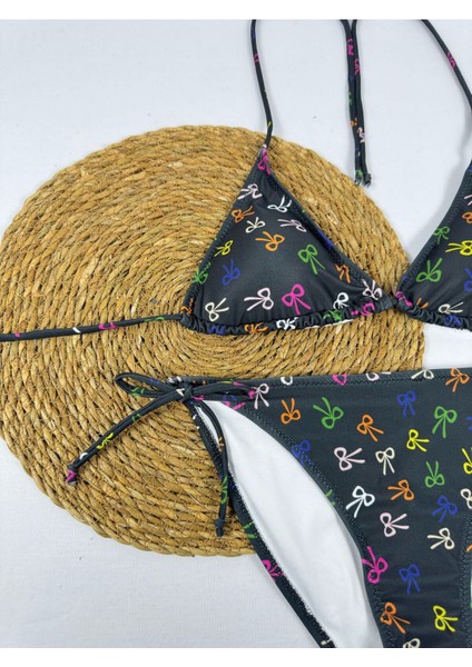 Siyah Renkli Fiyonk Desenli Boyundan Bağlamalı Şık Üçgen Bikini Takımı modelleri