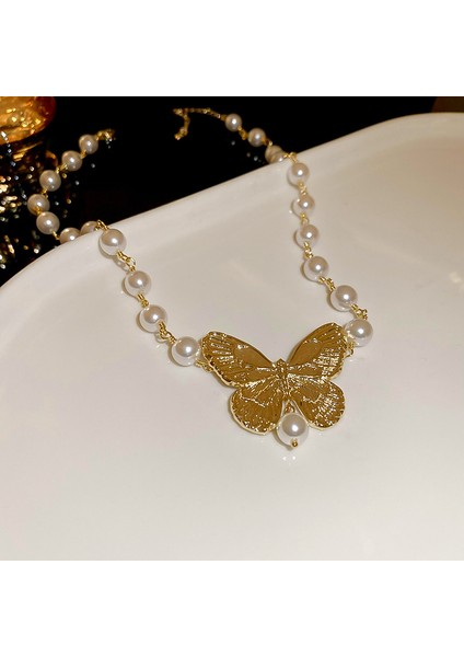 Zarif, Tatlı Suni Inciler ve Kelebek Kadın Köprücük Kemiği Kolyesi (Yurt Dışından) fiyatları