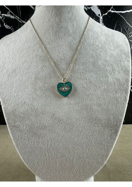 Göz Figürlü Çelik Mineli Kalp Kolye