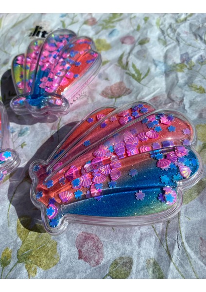 Karışık Renkli Deniz Kabuğu Şeklinde Simli ve Pullu Kırılma Karşıtı Şık Saç Fırçası Tarak modelleri