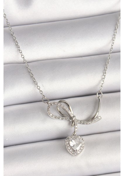 316L Çelik Gümüş Renk Zincir Zirkon Taşlı Düğüm Sallantı Kalp Figür Kadın Kolye TG27BKO9856