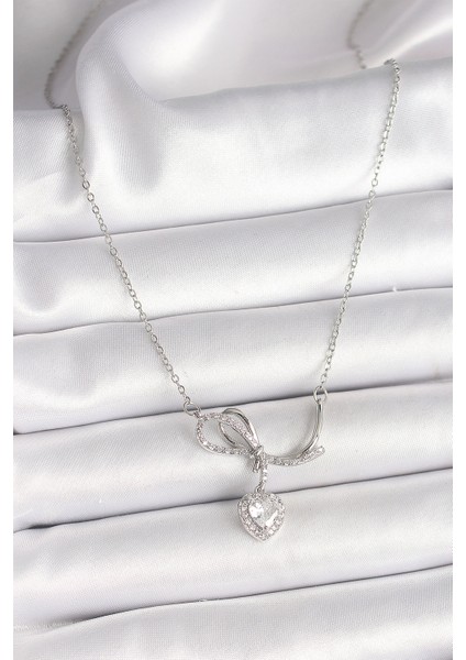 316L Çelik Gümüş Renk Zincir Zirkon Taşlı Düğüm Sallantı Kalp Figür Kadın Kolye TG27BKO9856 fiyatları