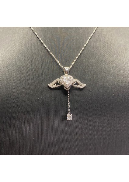 925 Ayar Gümüş Zirkon Taşlarla Kaplı Sarkıt Kanatlı Kalp Kolye