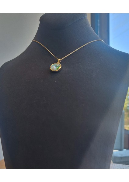 Mineli Inci Detaylı Zarif Gold Kolye – Mavi Yuvarlak Çerçeveli Tasarım fiyatları