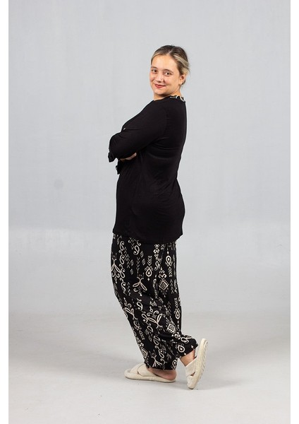 Büyük Beden Evde Şıklığın ve Konforun Dansı: Bol Paça Pijama Takımı! fırsatları