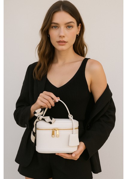 Kadın Dikdörtgen Formlu Çapraz Askılı El ve Omuz Çantası Melina indirimleri