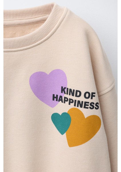 Kız Çocuk Pamuklu Bej Kalpli Sweatshirt ve Renkli Kalpli Siyah Tayt Takım modelleri