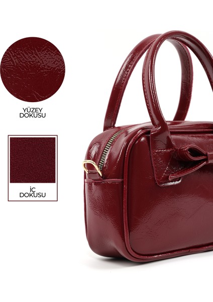 Kırışık Dokulu Bordo SHK217 Fiyonklu Suni Deri, Tek Bölmeli, Fermuarlı,kolon Askılı, El, Kol ve Omuz Çantası indirimleri