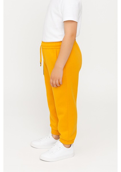 Lastikli Rahat Kesim Cepli Erkek ve Kız Çocuk Unisex Eşofman Altı Hardal modelleri