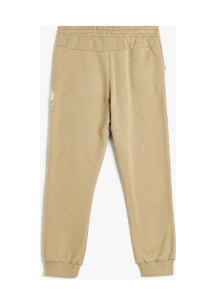 Jogger Eşofman Altı Beli Bağlamalı Şardonlu Pamuklu fiyatları