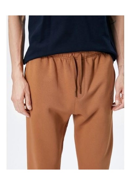 Jogger Eşofman Altı Beli Bağcıklı Cep Detaylı İşlemeli