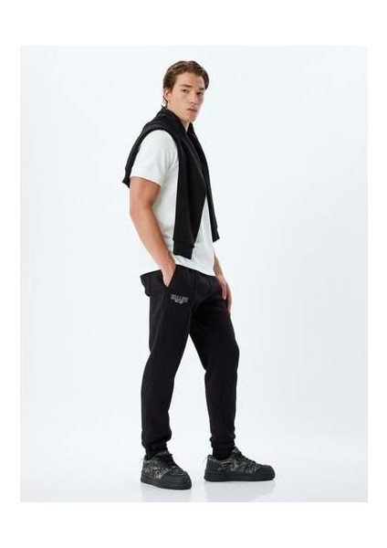 Spor Eşofman Altı Jogger Slogan Baskılı Cep Detaylı Pamuk Karışımlı fırsatları