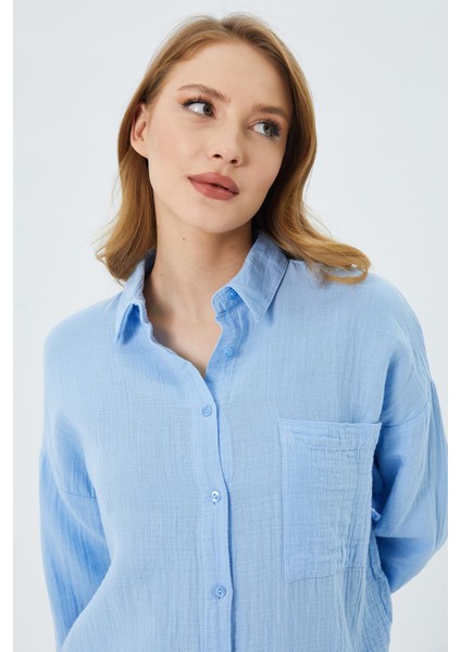 3833 Kadın Oversize Cepli Müslin Gömlek Bebe Mavi fırsatları