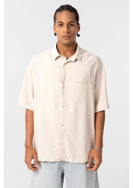 Arka Baskılı Tensel Oversize Gömlek Bej modelleri