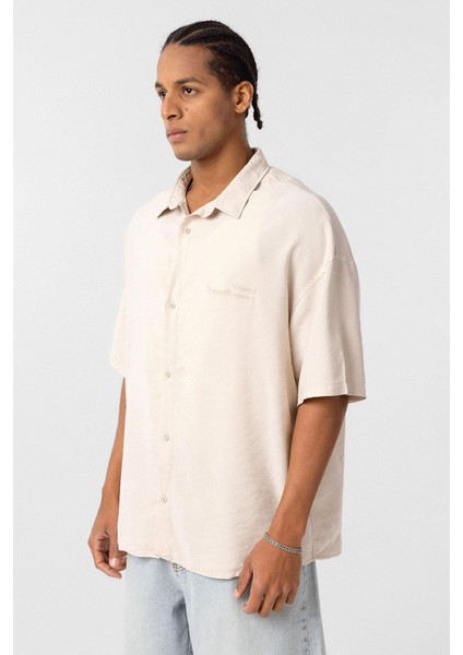 Arka Baskılı Tensel Oversize Gömlek Bej fırsatları