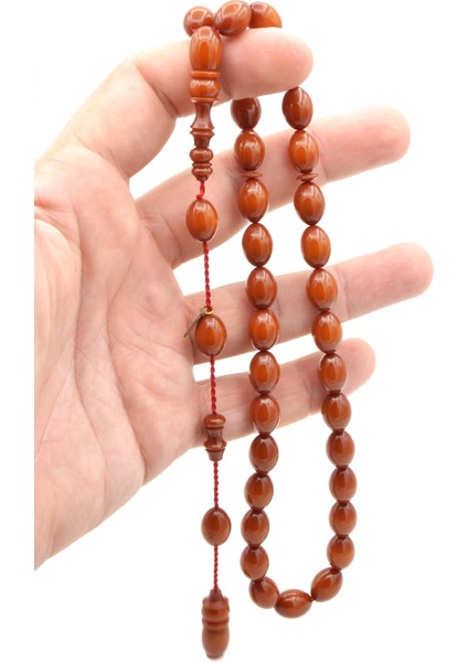 Hakkı Usta Imzalı Beyzi Kesim Zar Rengi Sıkma Kehribar Tesbih 002 modelleri